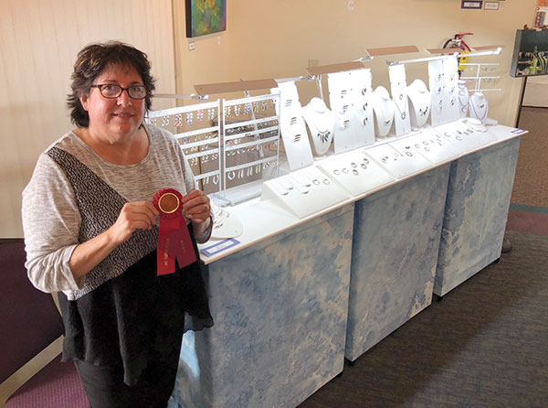 Former graphic designer created new career as jewelry designer