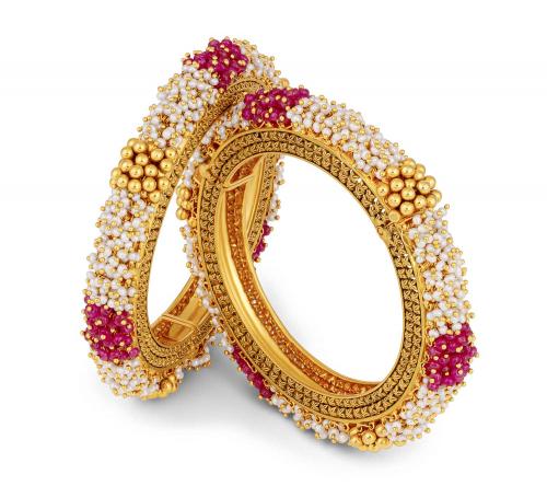 Gold Jewellery embellished with precious gems and stones