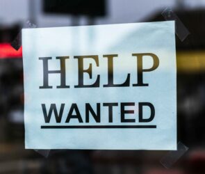 Photo by Tim Mossholder: https://www.pexels.com/photo/help-wanted-sign-on-glass-5737622/