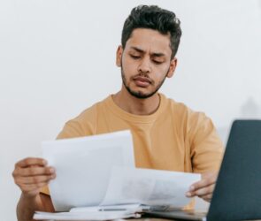 Photo by Michael Burrows: https://www.pexels.com/photo/man-looking-through-documents-at-workplace-7129713/
