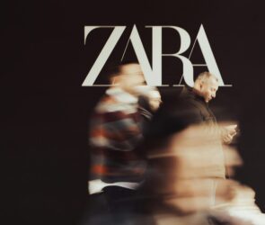 Photo by Burak Başgöze: https://www.pexels.com/photo/blurred-people-walking-along-black-wall-with-zara-logo-15673587/