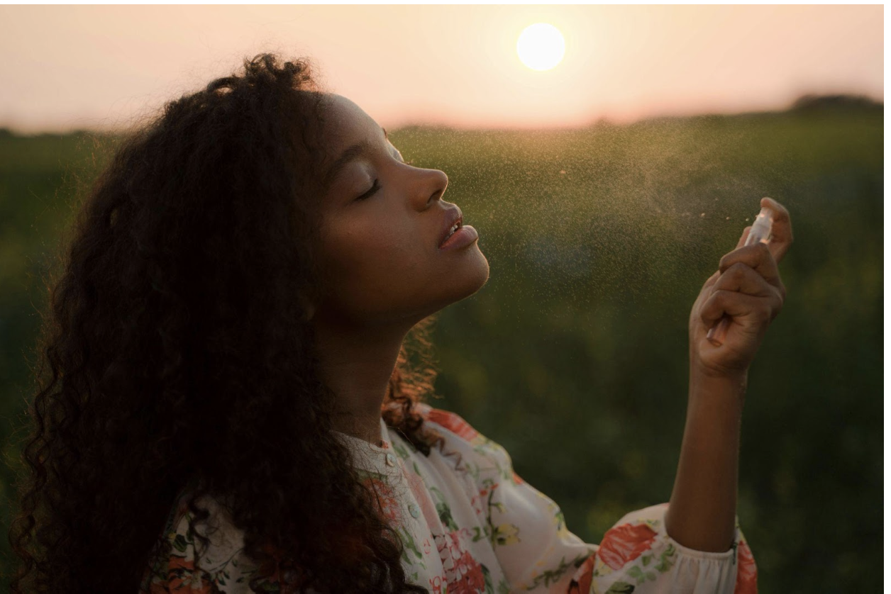 Photo by Ron Lach : https://www.pexels.com/photo/young-woman-spraying-perfumes-onto-her-face-10544091/