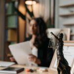 Photo by Pavel Danilyuk: https://www.pexels.com/photo/figurine-of-justice-on-table-in-office-8111815/