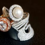 Photo by Marta Branco: https://www.pexels.com/photo/silver-colored-ring-with-clear-gemstone-and-white-pearl-1395306/