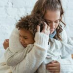 https://www.pexels.com/photo/loving-mother-hugging-cute-black-son-6624477/